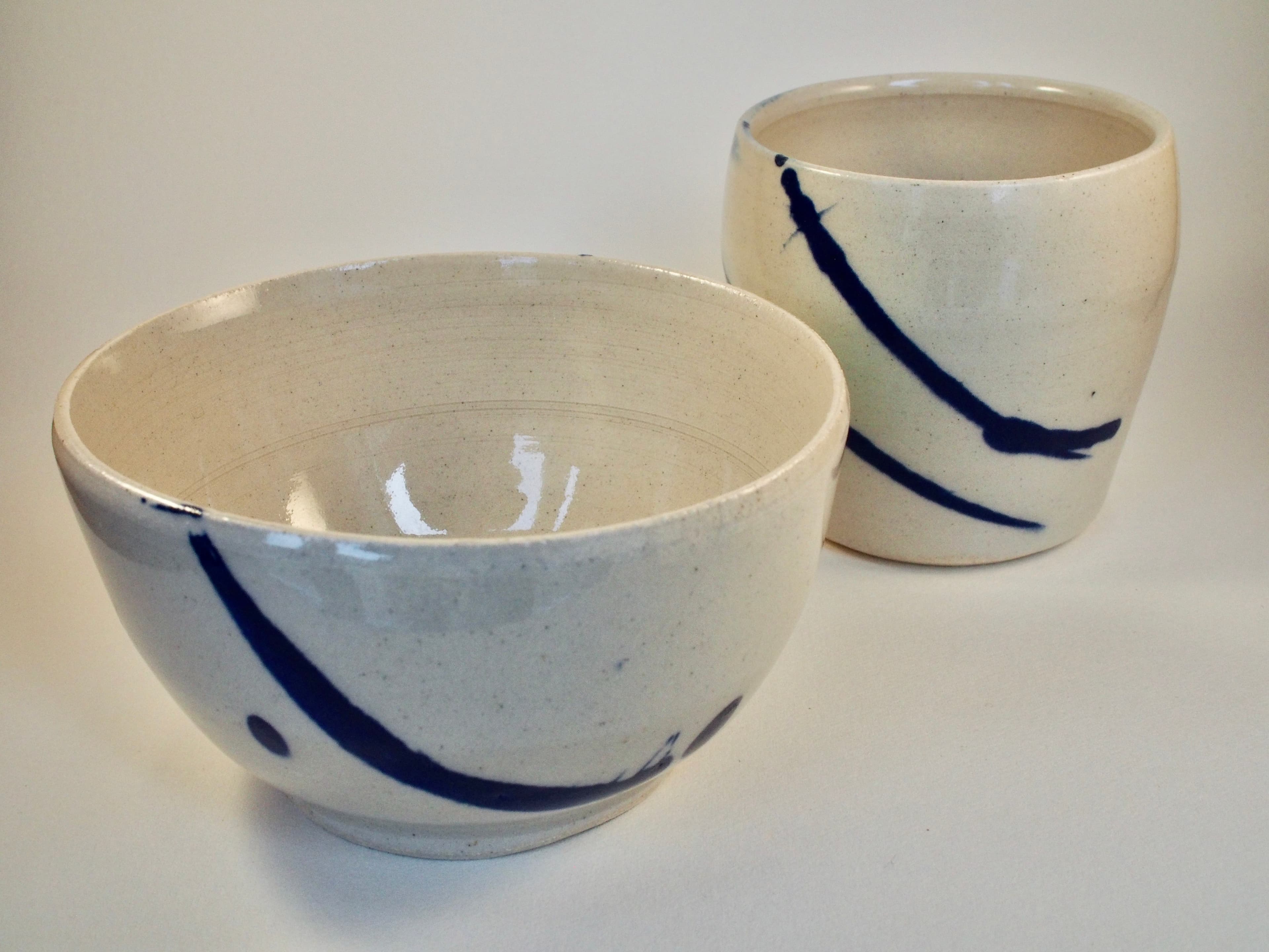 Cup and small bowl with cobalt slip